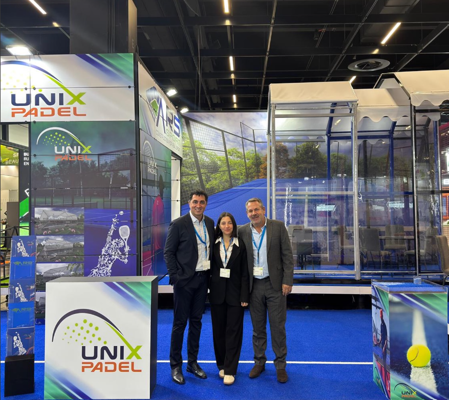 Panoramic padel court with orange and black structure on display at Unix Padel FSB Cologne stand